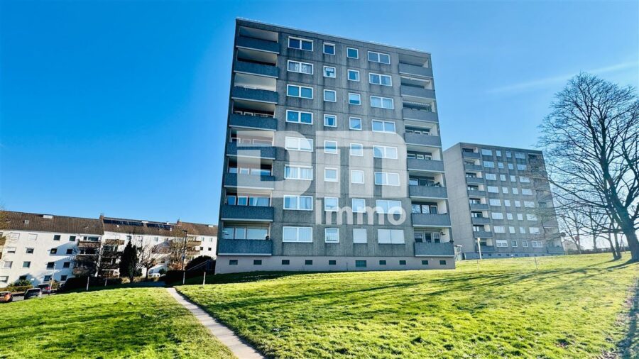 Modernisierte Eigentumswohnung mit Balkon in gepflegtem Mehrfamilienhaus - Rückansicht